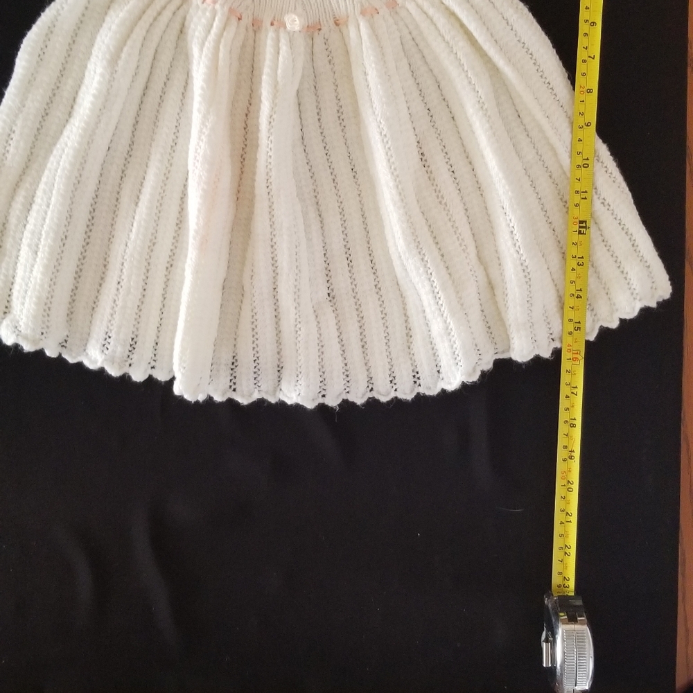 Hand knit baby clothes